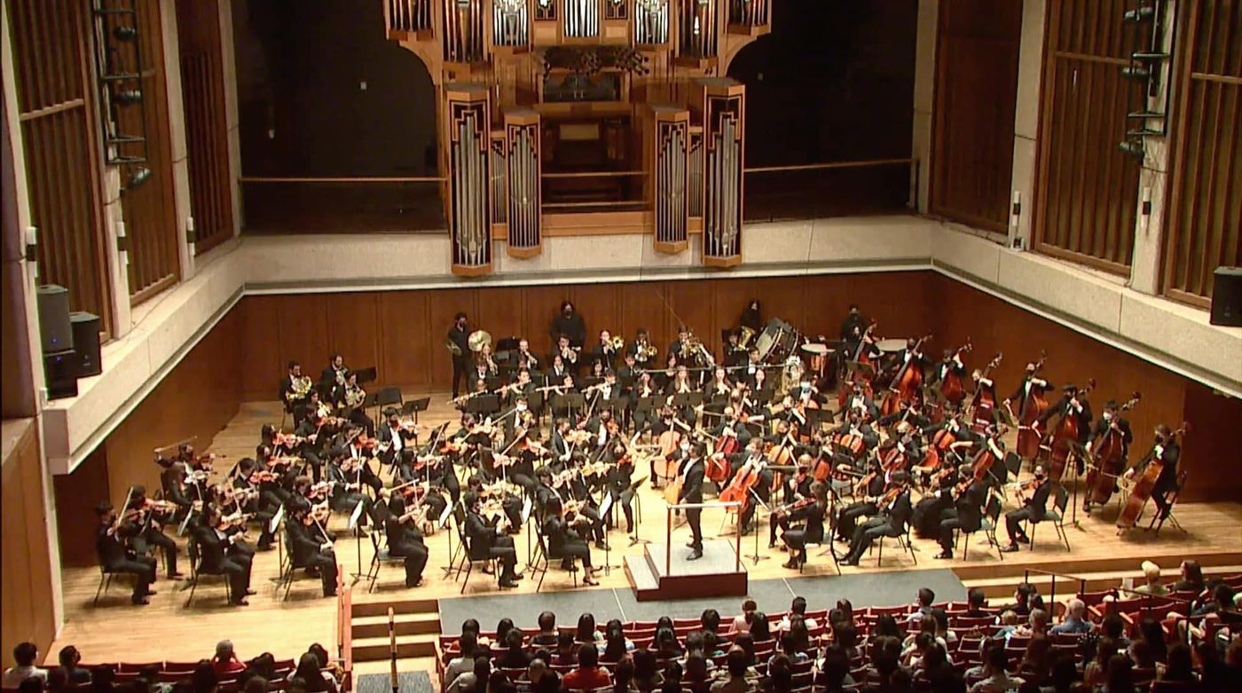 Full orchestra in concert hall